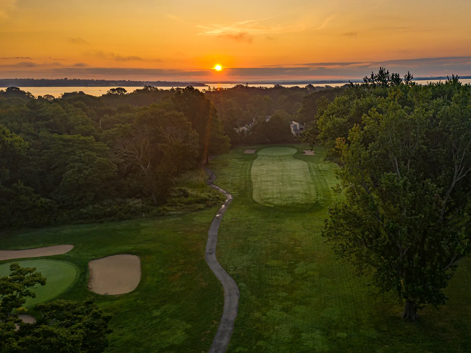 Sunset over Narragansett Bay, course in the foreground